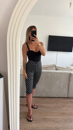 Capri noir à pois
