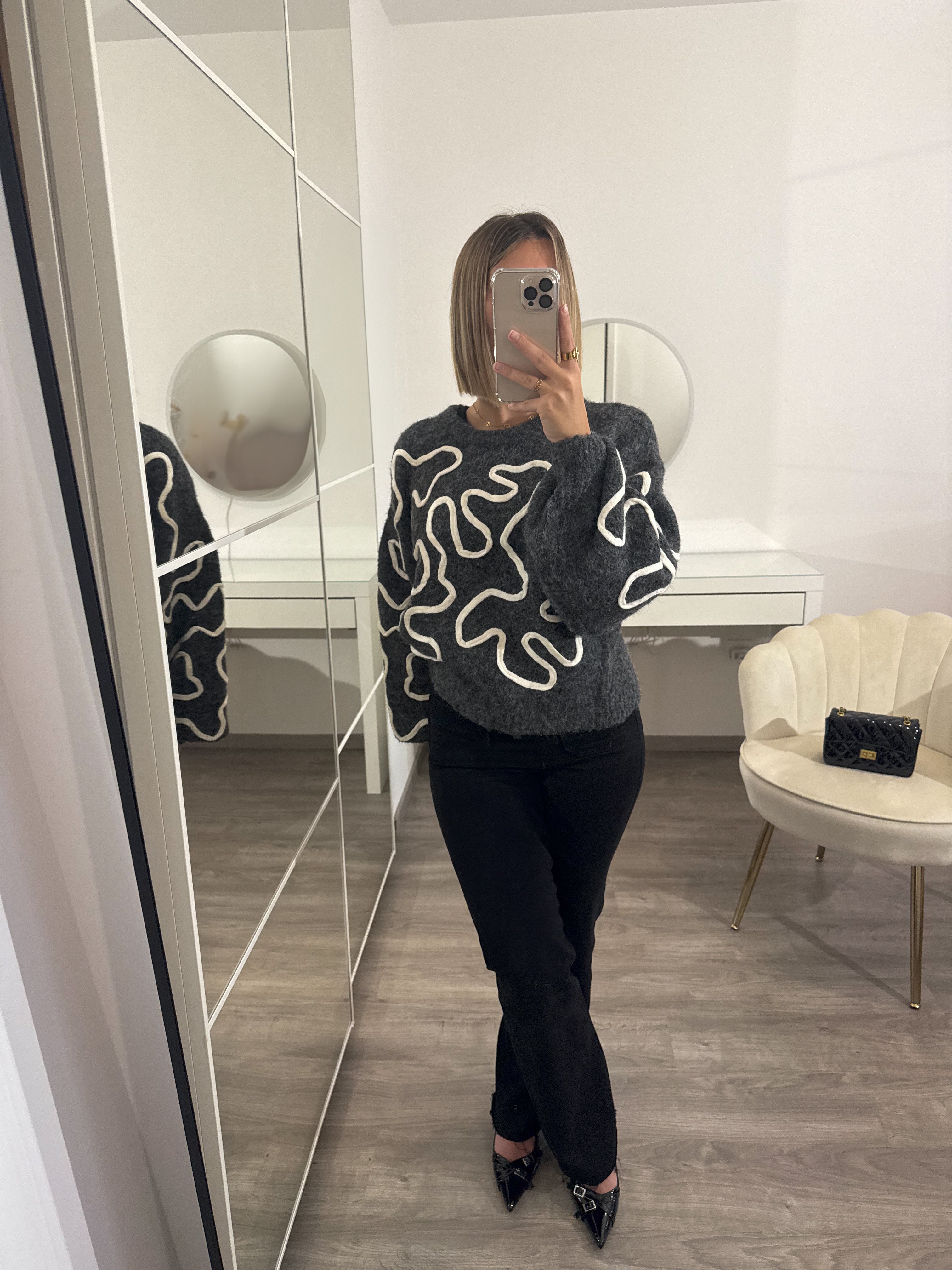 Pull gris à motifs