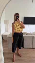 Top pois jaune